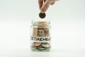 Coins and savings jar representing financial planning and saving for the future